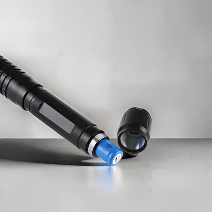 Tactical Flashlight With Integrated Green Laser Sight And Zoomable Beam